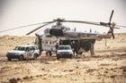 Personnels de la Minurso débarquant au point de passage frontalier entre le Maroc et la Mauritanie, à Guerguerat, localité située dans le sud-ouest du Sahara occidental, le 25 novembre 2020. © Fadel SENNA/AFP